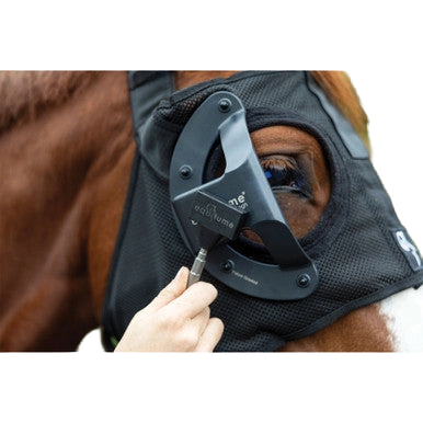 Equilume Pro Light Mask,"Horse wearing black light therapy mask with circular eye unit"