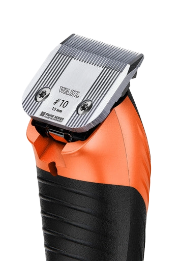 KM Velocity Clipper,"Orange and black clipper with metal blade close-up"