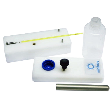 Manual Ball Sealer,"Disassembled clear bottle sealer with rods and caps"