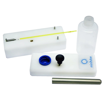 Manual Ball Sealer,"Sealer kit with bottle, white blocks, blue cap, and metal rod"
