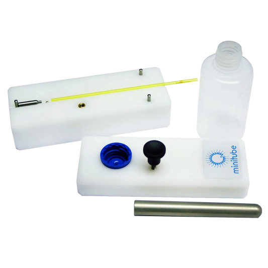 Manual Ball Sealer,"Sealer kit with bottle, white blocks, blue cap, and metal rod"