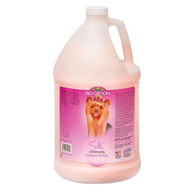 Silk™ Conditioning Creme Rinse,"Large plastic jug with handle and pink label"