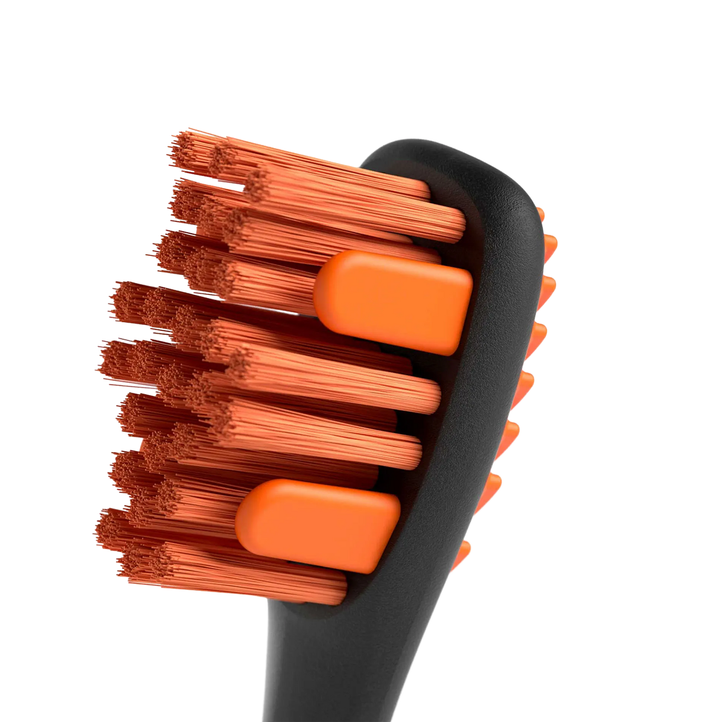 BrushMate Premium Toothbrush with Biteblock,"Close-up of toothbrush head with orange bristles and bite blocks"