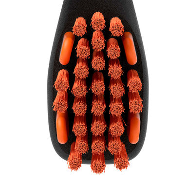 BrushMate Premium Toothbrush,"Close-up of toothbrush head with orange bristles"