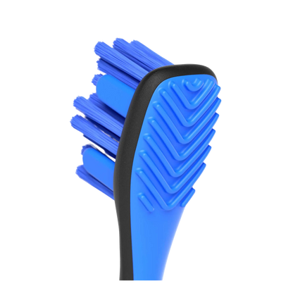 BrushMate Premium Toothbrush with Biteblock,"Close-up of blue toothbrush head with textured bite block"