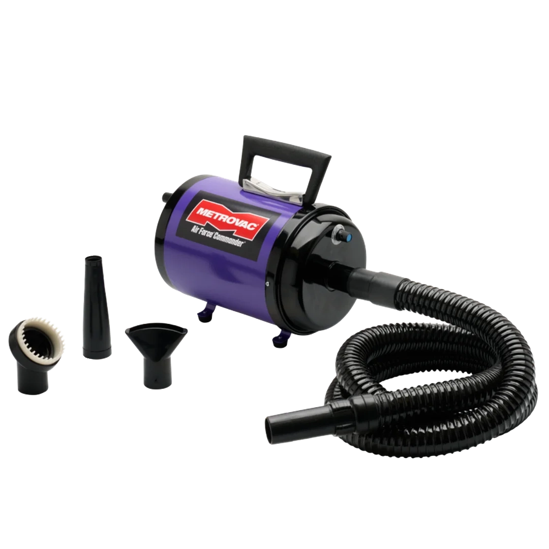 Air Force Commander Variable Speed Dryer,"Purple dryer with coiled hose and three nozzle attachments"