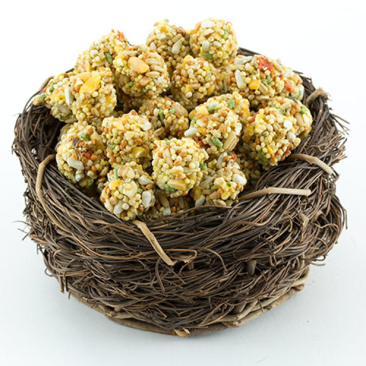 Lafeber Gourmet Sunny Orchard Nutri-Berries,"Seed and grain treat balls piled in a twig nest"
