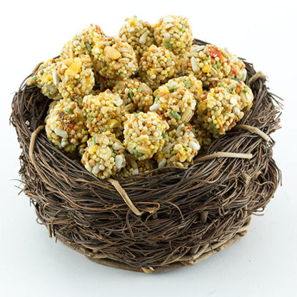 Lafeber Gourmet Sunny Orchard Nutri-Berries,"Seed and grain treat balls piled in a twig nest"