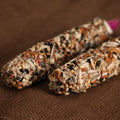 Smakers Treat Sticks,"Two seed-coated treat sticks close up"