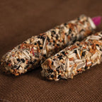 Smakers Treat Sticks,"Two seed-coated treat sticks close up"