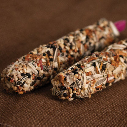 Smakers Treat Sticks,"Two seed-coated treat sticks close up"