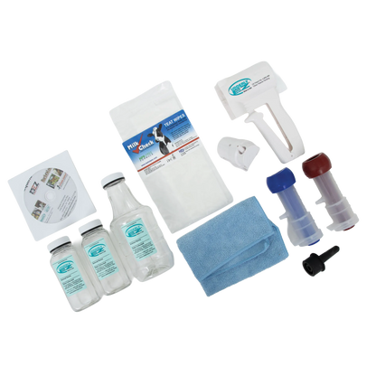 Udderly EZ Horse Milker,"Horse milking kit with bottles, teat wipes, applicator, and blue towel"