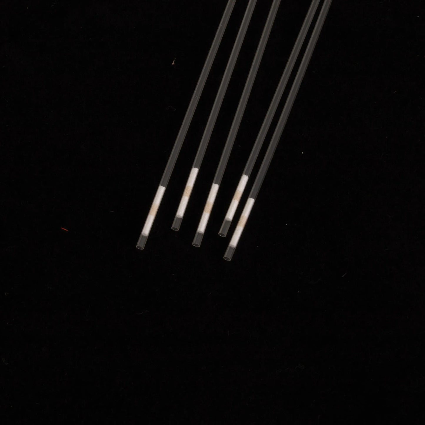 Straw, Radiated,"Five clear plastic straws with white cotton inserts"