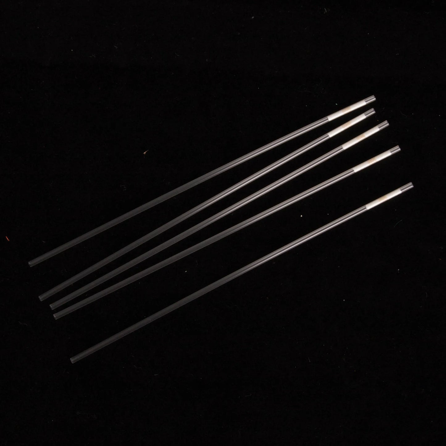 Straw, Radiated,"Five clear plastic straws with white cotton plugs"
