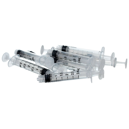 Small Syringes without Needles,"Pile of clear plastic syringes without needles"