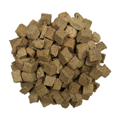 Adventure Fuel: Freeze-Dried Raw Dog Food,"Pile of freeze-dried dog food cubes"