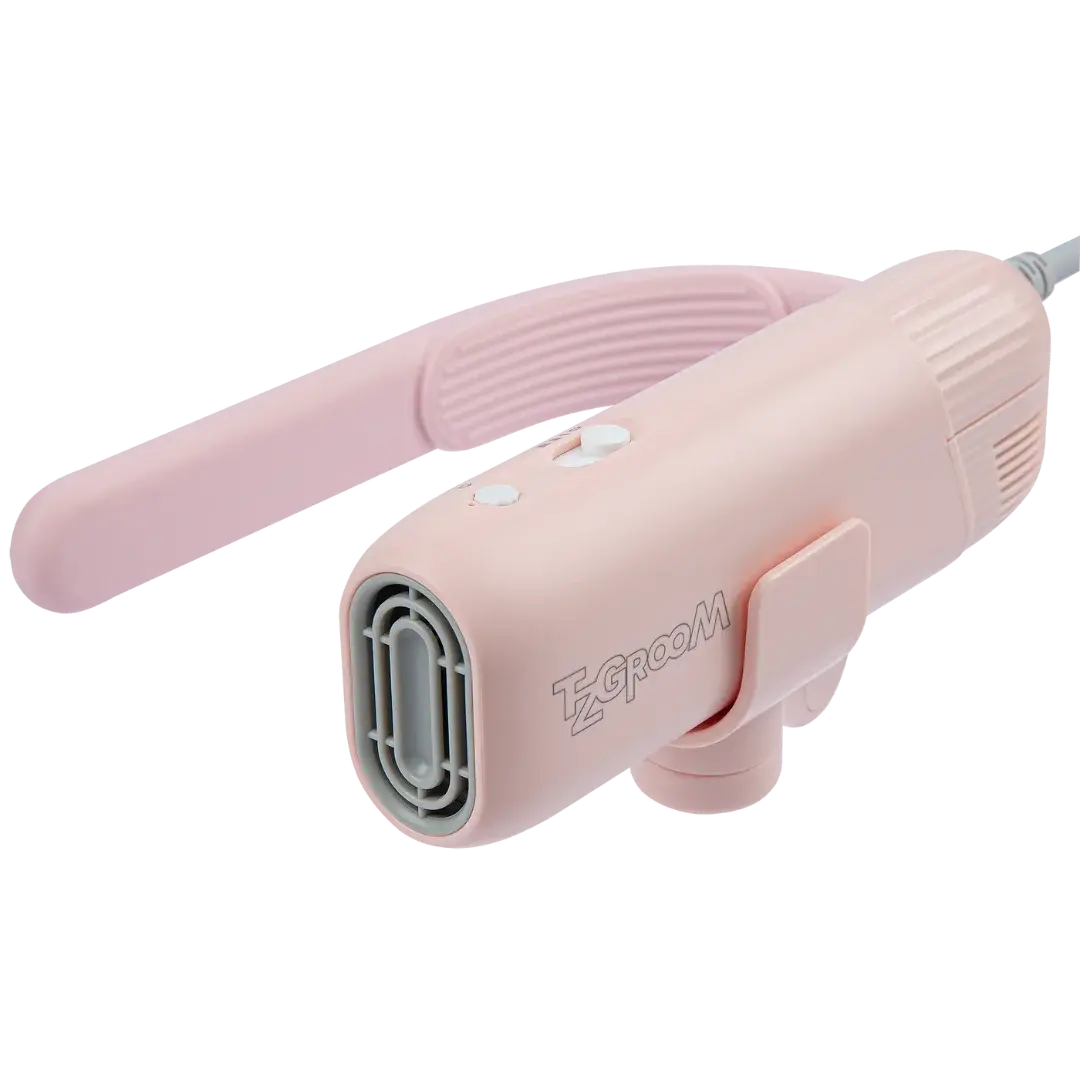 Mini Portable Neck Dryer by TZGroom,"Pink handheld dryer with curved handle and front vent"
