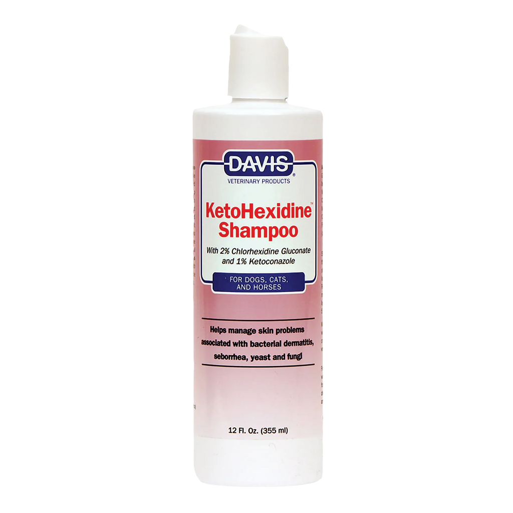 Ketohexidine Shampoo,"Pink shampoo bottle with white flip-top cap"