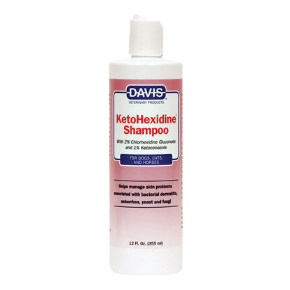 Ketohexidine Shampoo,"Pink shampoo bottle with white flip-top cap"