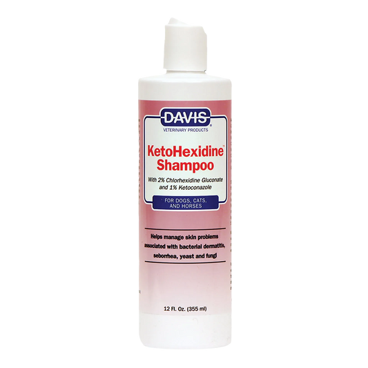 Ketohexidine Shampoo,"Pink shampoo bottle with white flip-top cap"