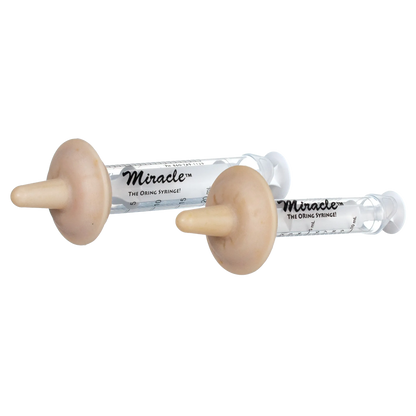 The Miracle Nipple® for Puppies,"Two syringes with beige puppy nursing nipples"
