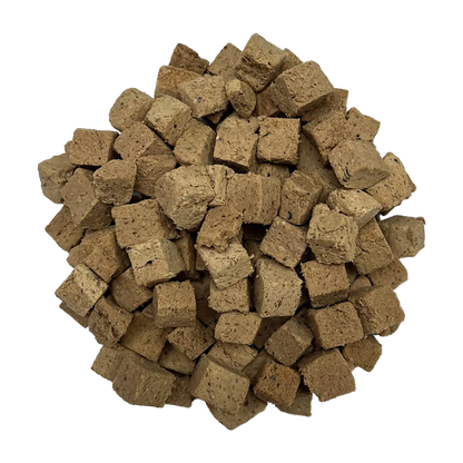 Adventure Fuel: Freeze-Dried Raw Dog Food,"Pile of brown freeze-dried dog food cubes"