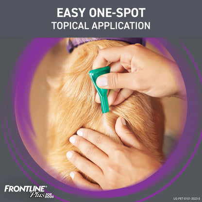Frontline® Plus for Dogs,"Hand applying green topical applicator to parted dog fur"