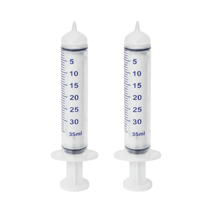 Puppywamer Latchons Syringe Nipple Feeders,"Pair of clear feeding syringes with soft nipple tips"