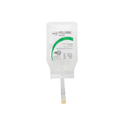 ABT360 Holding Media Adapt with HA,"Clear hanging IV-style pouch with tubing and yellow cap"