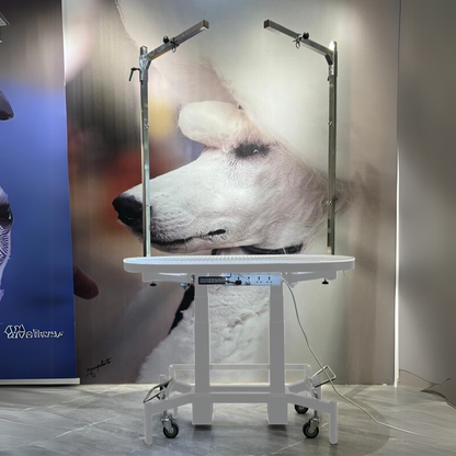 Premium Electric Table by TZGroom,"White electric grooming table with overhead arm and wheels"