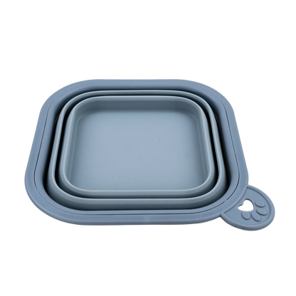 Replacement Collapsible Dog Bowls,"Blue collapsible square pet bowl with paw-shaped tab"