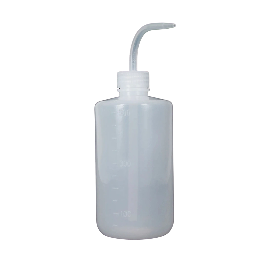 500ml Wash Bottle,"Clear wash bottle with angled dispensing nozzle"