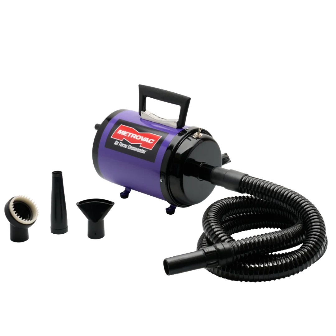 Air Force Commander Two Speed Dryer,"Purple canister dryer with coiled hose and three nozzle attachments"