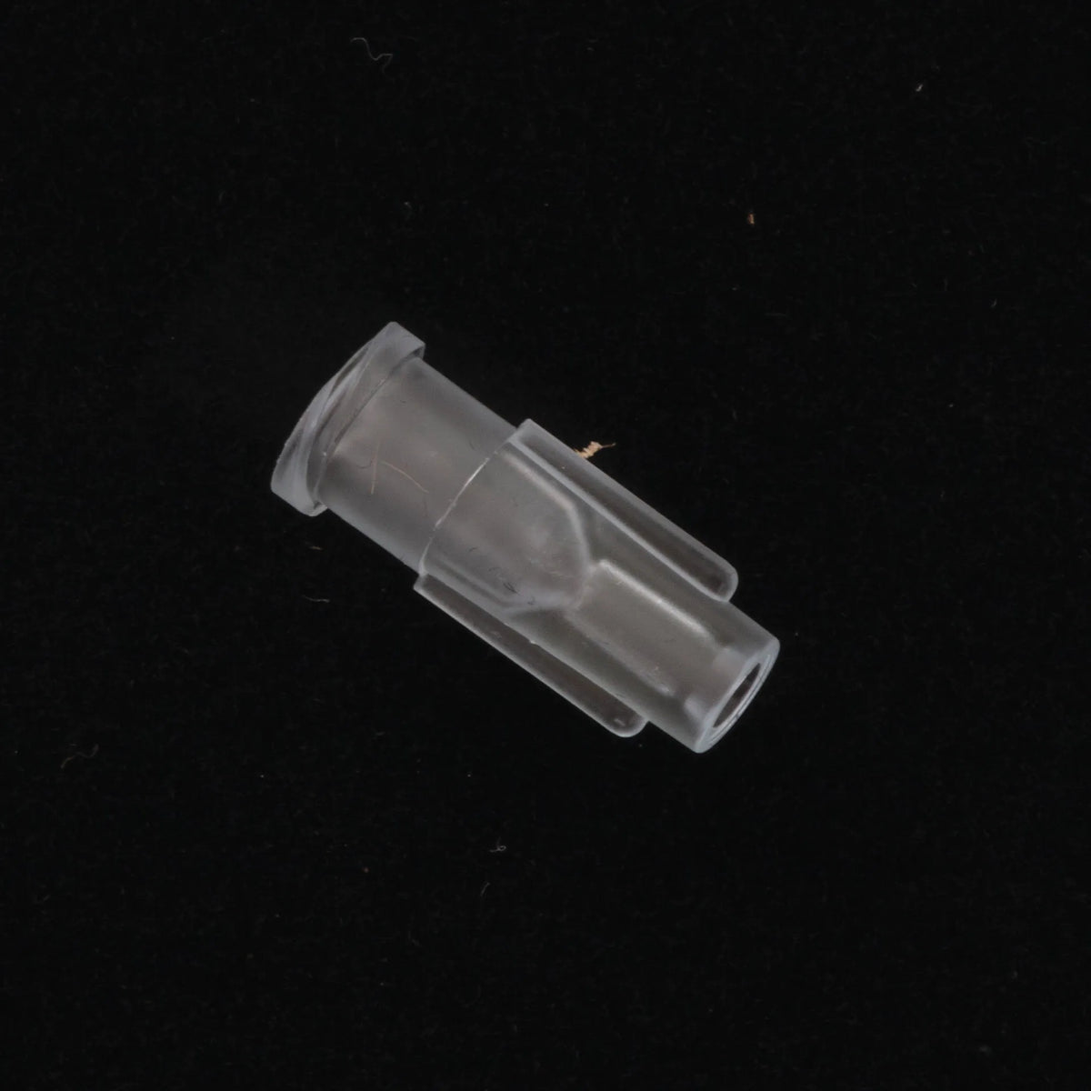Straw Adapter,"Clear plastic adapter with flanged end and tapered nozzle"