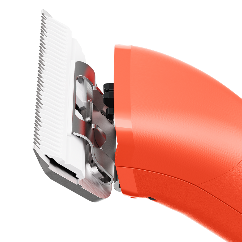 Emerge Clipper Orange with Wide 30 Blade,"Close-up of orange clipper with wide white blade"