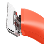Emerge Clipper Orange with Wide 30 Blade,"Close-up of orange clipper with wide white blade"