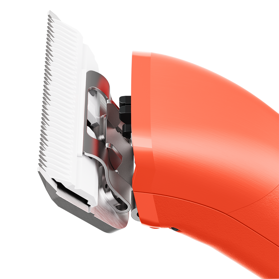 Emerge Clipper Orange with Wide 30 Blade,"Close-up of orange clipper with wide white blade"