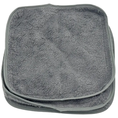 Puppywarmer Fleece Inserts,"Two stacked gray fleece pad inserts"