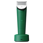 Vida Green Cordless Clipper by Andis,"Green cordless clipper standing upright on charging base"