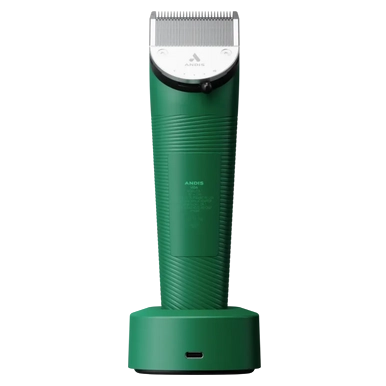 Vida Green Cordless Clipper by Andis,"Green cordless clipper standing upright on charging base"
