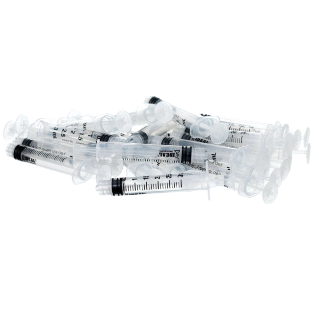 Small Syringes without Needles,"Pile of clear plastic syringes without needles"