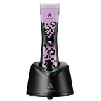 Pulse ZR II Wild Limited Edition Clipper by Andis,"Pink and black patterned clipper on charging stand"