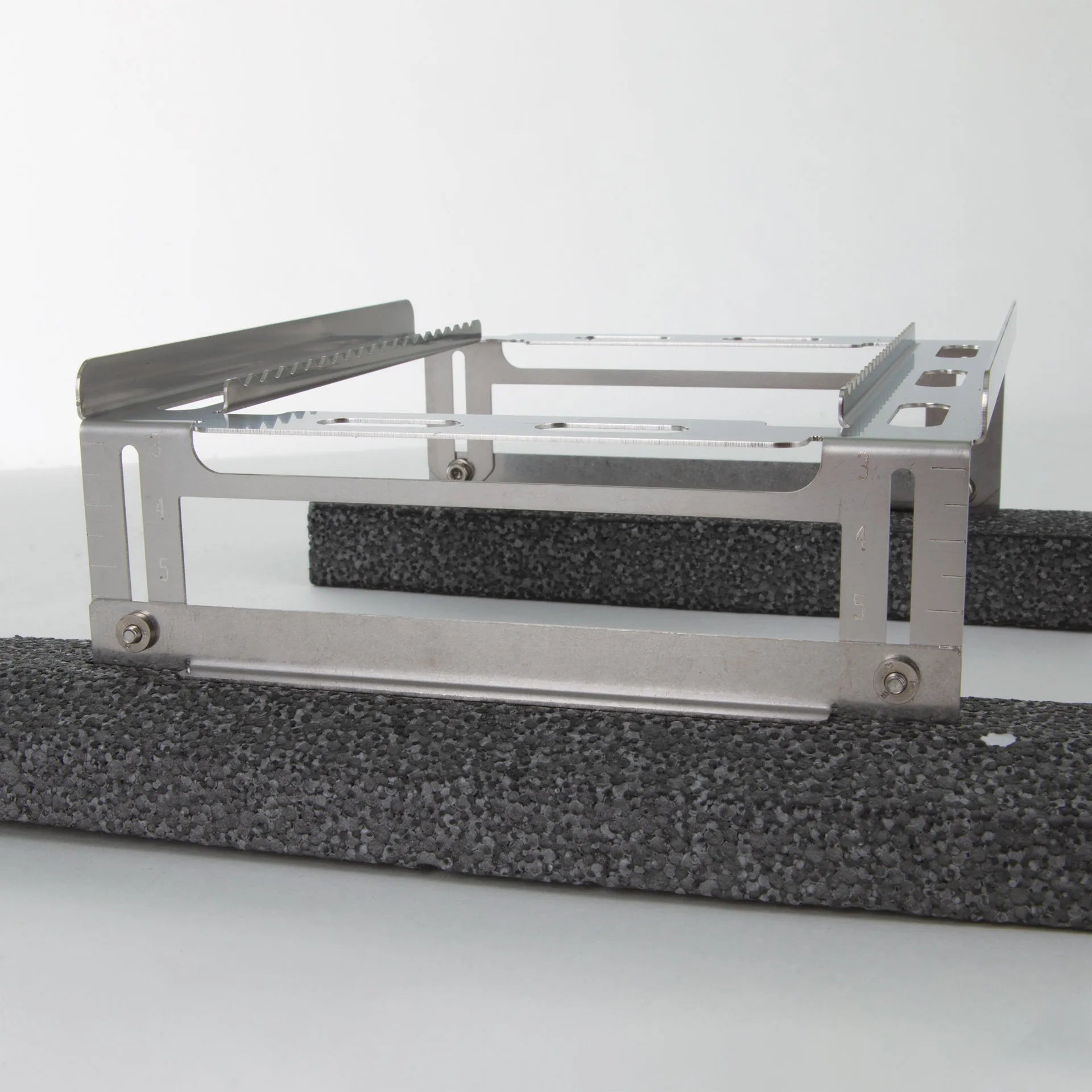 Floating Straw Rack,"Metal rack with serrated rails and foam float insert"
