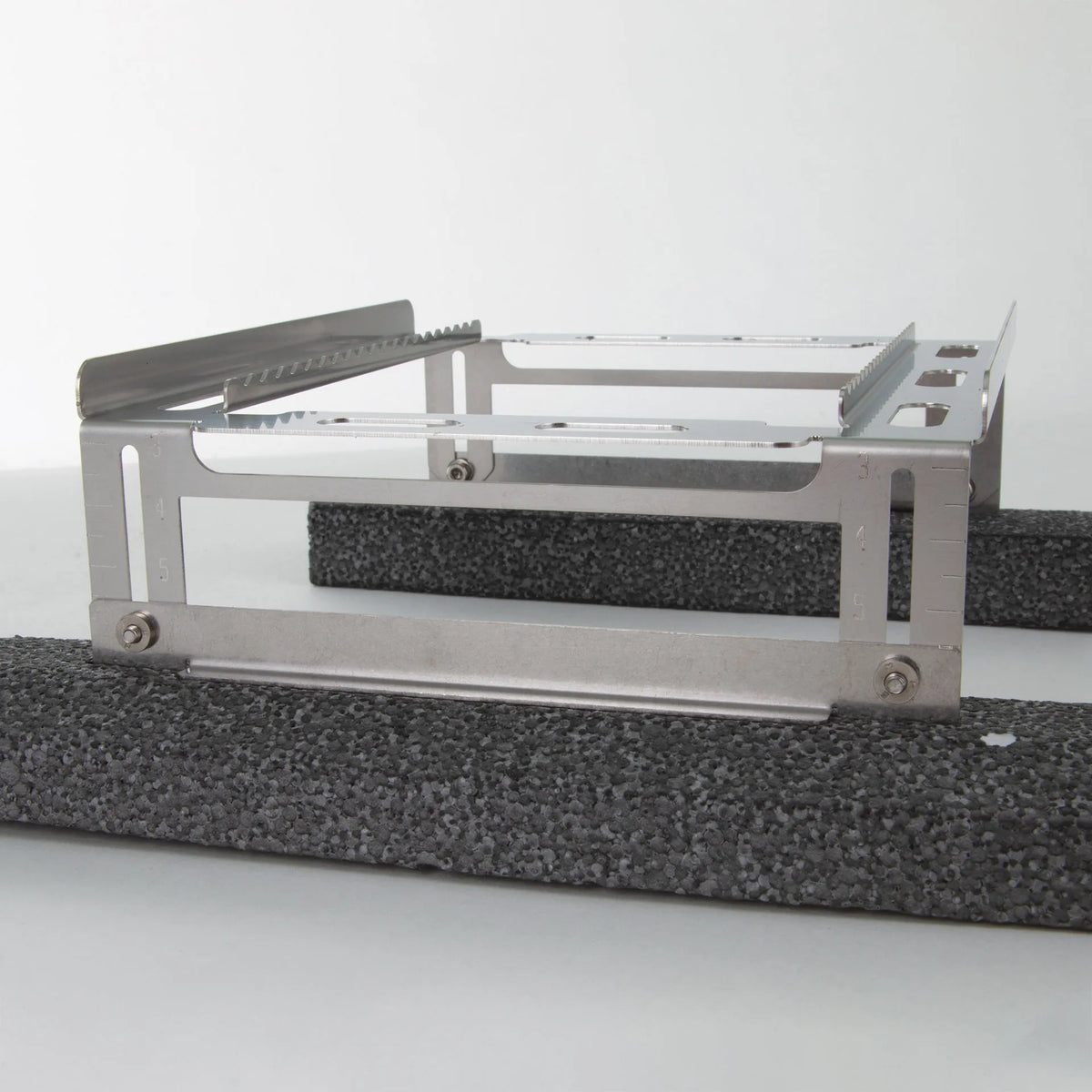 Floating Straw Rack,"Metal rack with serrated rails and foam float insert"