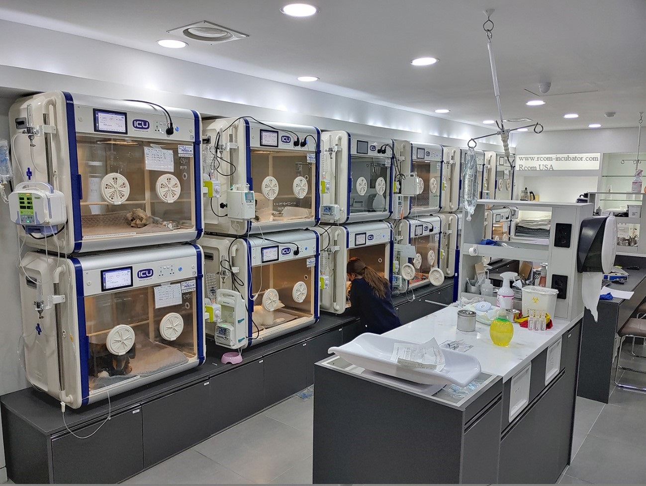 ICU 160 V2 by Rcom USA,"Multiple incubator units installed in a clinical room"