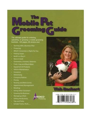 The Mobile Pet Grooming Guide by Tish Bachert,"Book cover with woman holding two dogs"