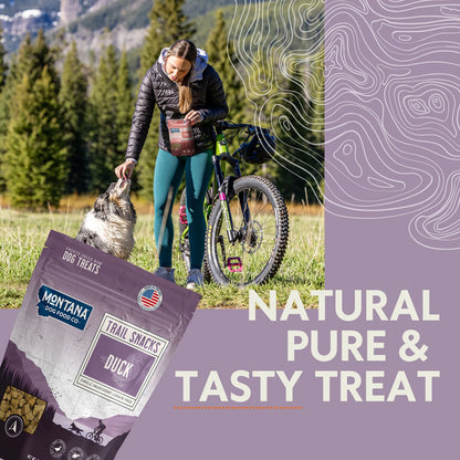 Trail Snacks: Freeze-Dried Raw Dog Treats,"Dog treat bag with woman feeding dog beside a mountain bike"