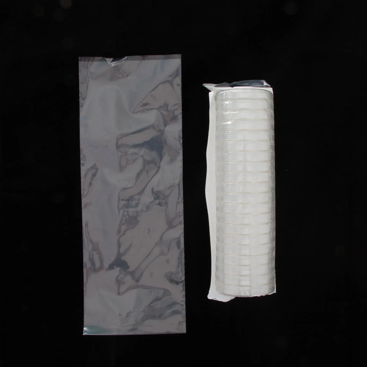 Petri Dish 100x15mm,"Stack of clear petri dishes in sealed sleeve beside foil pouch"