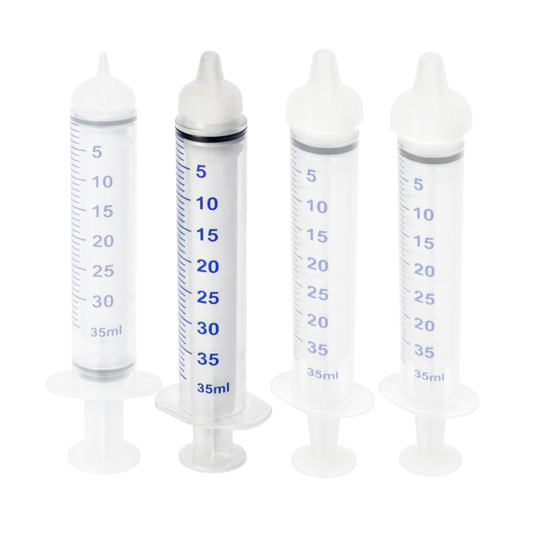Puppywarmer Bundles,"Four clear feeding syringes with white caps"