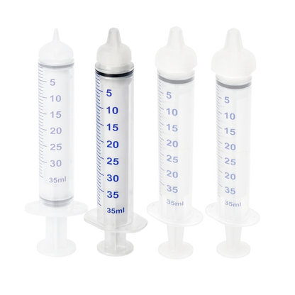 Puppywarmer Bundles,"Four clear feeding syringes with white caps"